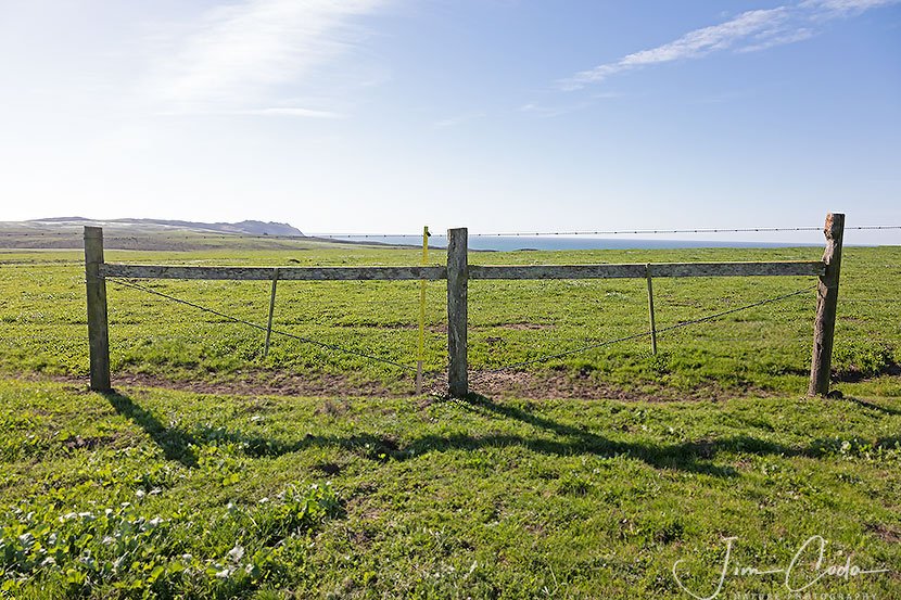 This is a photo of a fence that was made wildlife-friendly and then a rancher undid that.