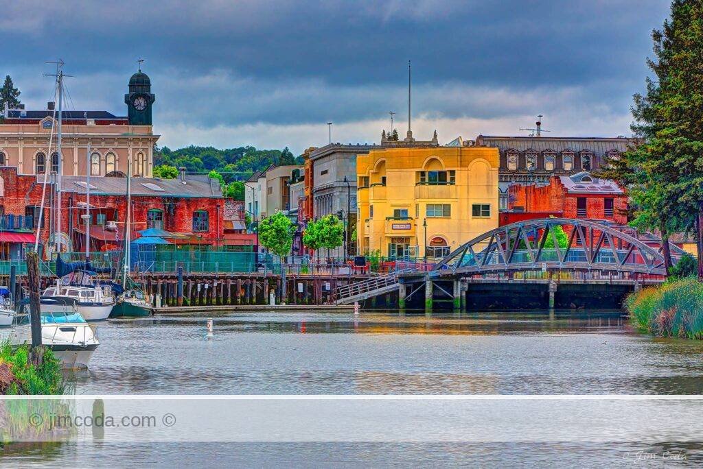 This is an early morning photograph of the Petaluma River Turning Basin and the City of Petaluma's skyline.