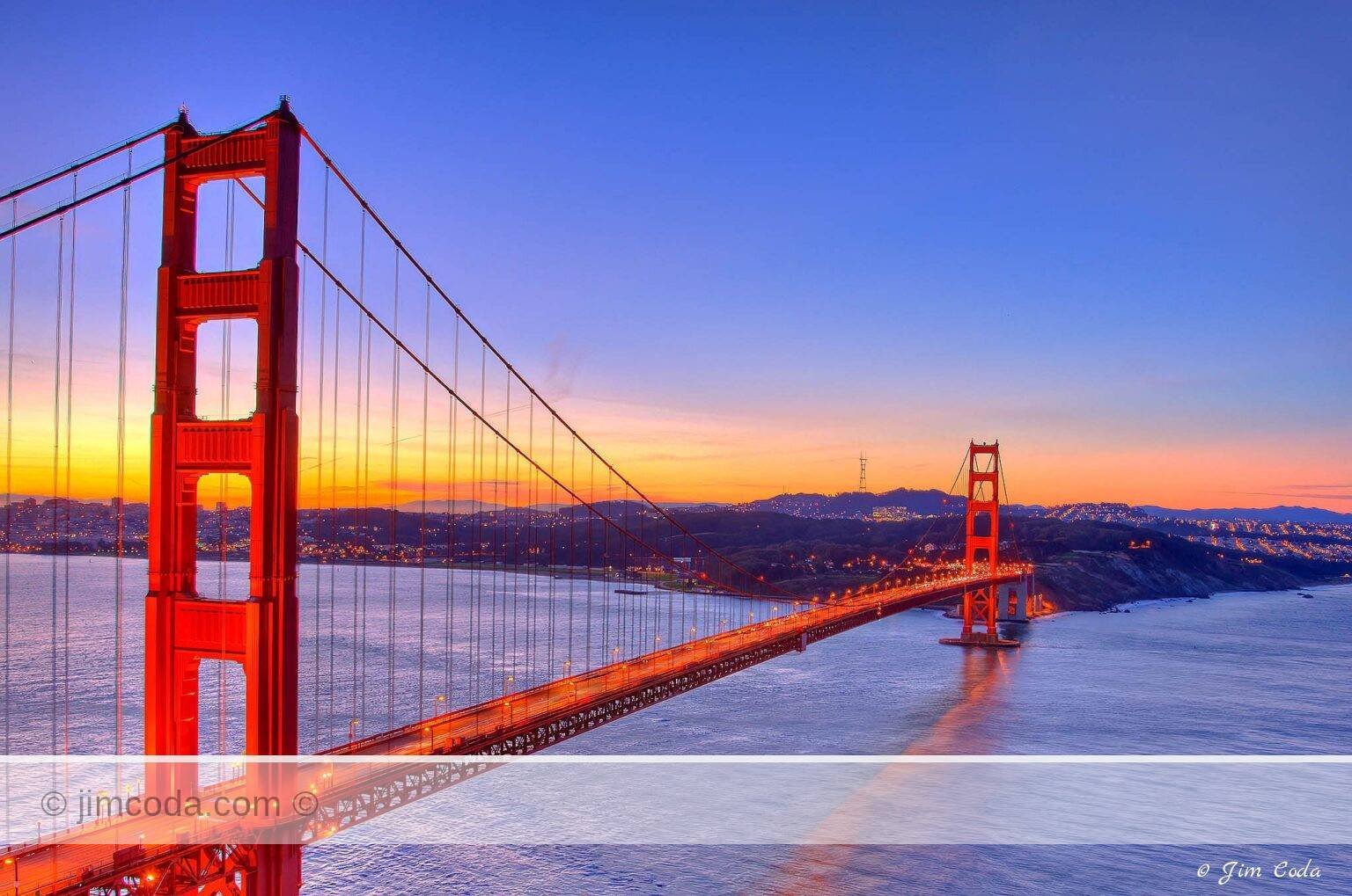 This is a view of the Golden Gate Bridge at sunrise.