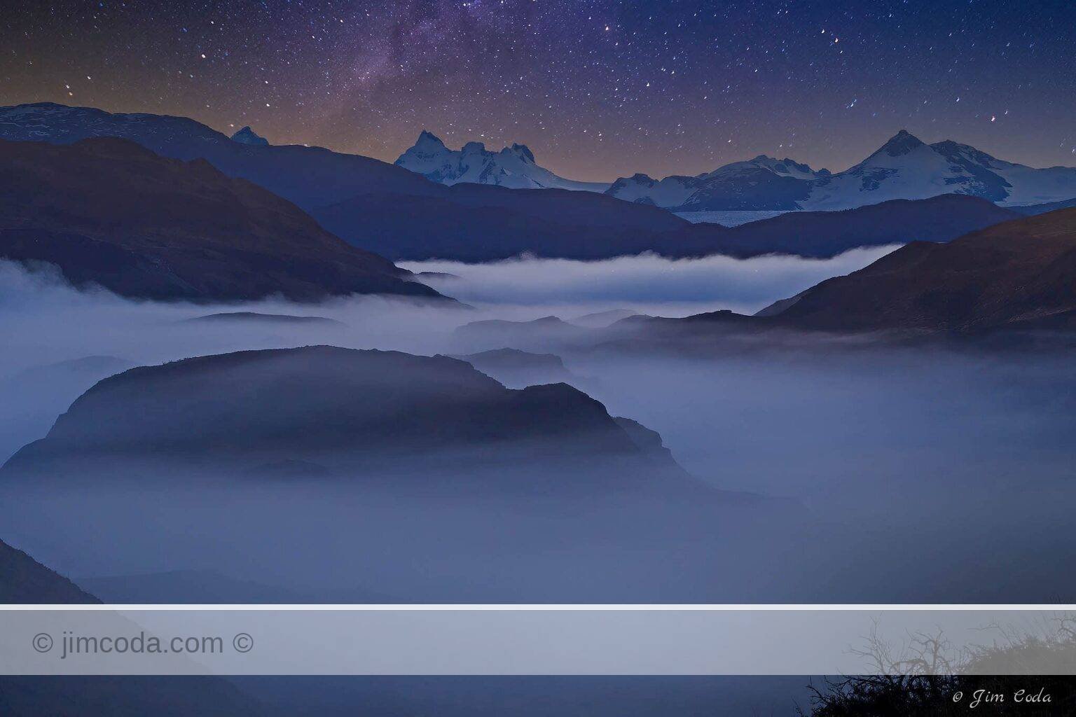 This is a photo of the skyline and mountains of Torres del Paine National Park at night in Chile's Patagonia region.